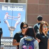Photo of students at the fall Be Involved Fair at the UMC fountain.