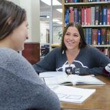 Student studying in library.