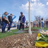 Tom Whittington, the father of shooting victim Teri Leiker, submits an offering during the dedication ceremony.