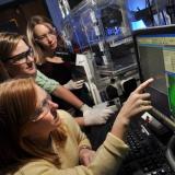 Researchers collaborate in lab