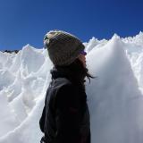 Lara Vimercati examines a nieves penitentes structure on Volcán Llullaillaco in Chile
