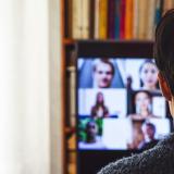 Stock image of a person on a Zoom call