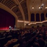 Speaker addresses crowd in Macky Auditorium