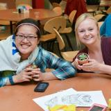 Students take home tiny succulents at a campus event