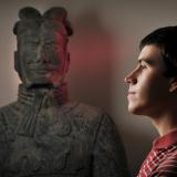 Student Nick Bertrand with terracotta warrior statue