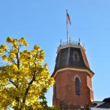 American flag flies atop of Old Main