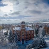 Old Main and a snowy campus