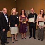 Chancellor Phil DiStefano, Dean of Continuing Education Sara Thompson and Provost Russ Moore with past award recipients