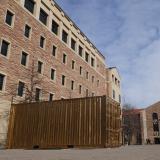 gold shipping container on the CU Boulder campus 