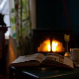 Book being read by firelight