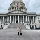 Professor Sona Dimidijan and Psychologist Julia Zigarelli stand in front of the capitol.