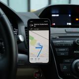 GPS directions displayed on a smartphone mounted in a vehicle