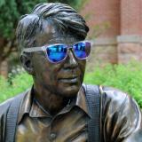 Robert Frost statue with sunglasses on