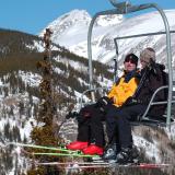 Skiers on chair lift