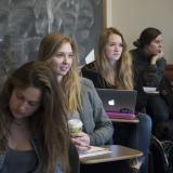 Students sit in a classroom.