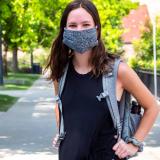 Student wearing a mask on campus