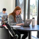 student studying on campus