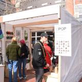 Environmental Design students selling products at their pop-up shop