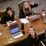 Four students studying at a table together