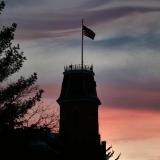 Silhouette of Old Main at sunset