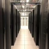 Rows of storage in a room holding computing technology.