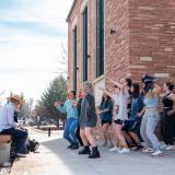Students dancing outside on campus