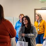 Employees picking up cold-care kits at a WorkWell event