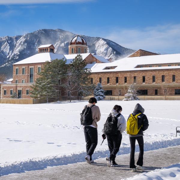 Students walking on a snowy campus