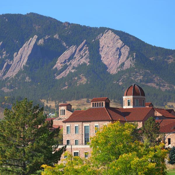 Leeds School of Business building with Flatirons in the background