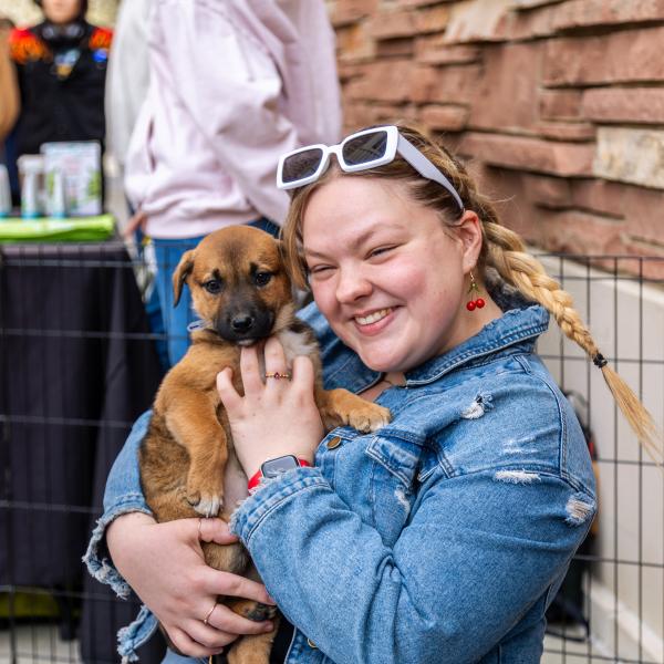 student with a therapy dog
