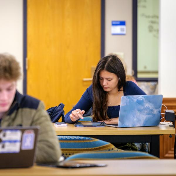 students studying on campus
