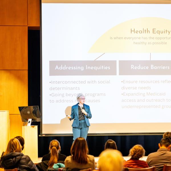 Jessica Doty giving the keynote address at the Health & Wellness Summit