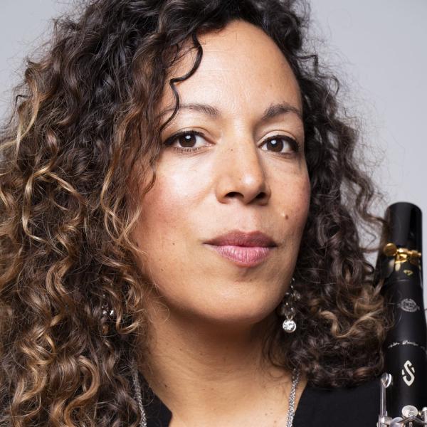 Mariam Adam is pictured with a clarinet to her side.