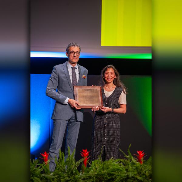 Lucy Pao receives an award