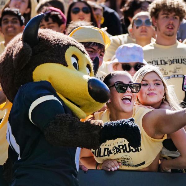 Buff fans take a selfie with Chip the buffalo mascot