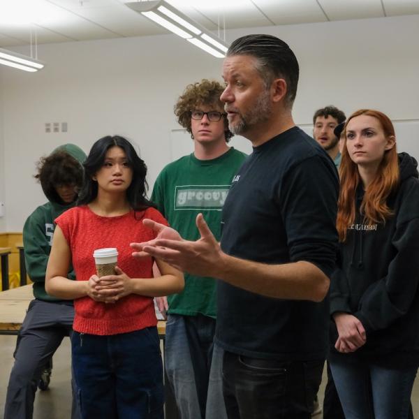 Zack Weaver instructs students
