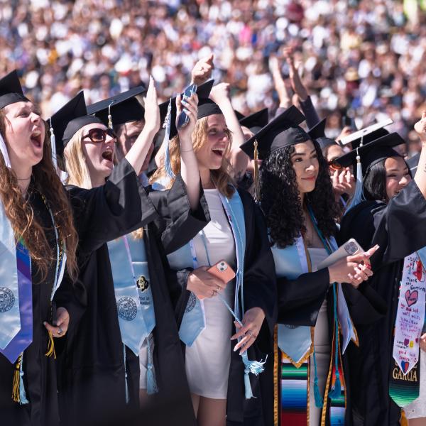 School of Education graduates cheer during the ceremony