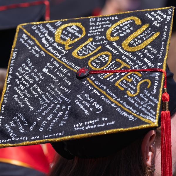 A graduate's cap decorated with 'CU quotes'