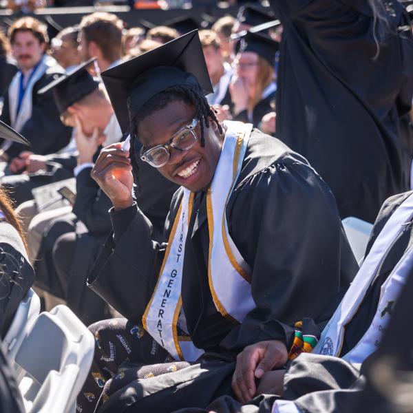 Graduates seated before the commencement ceremony