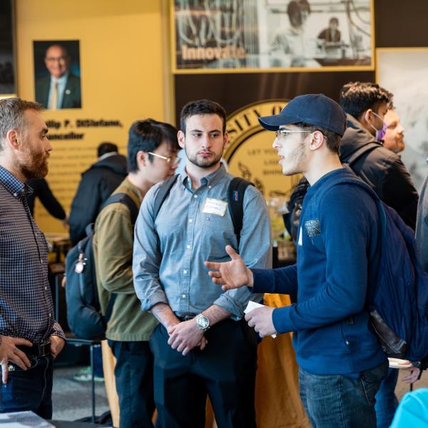 alumni and students at a Buffs Hire Buffs Career Services event