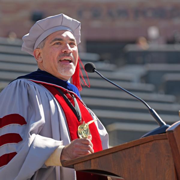 CU Boulder Chancellor Justin Schwartz speaks at the podium