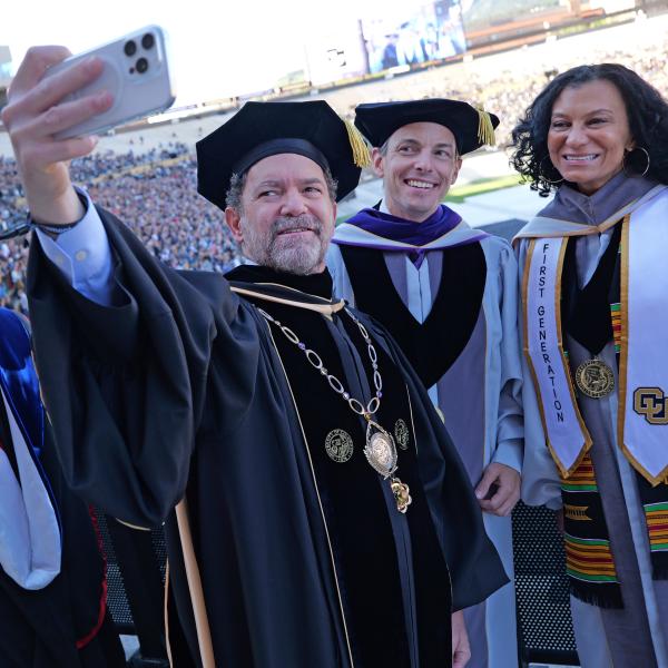 CU President Todd Saliman takes a selfie with regents Elliot Hood and Wanda James
