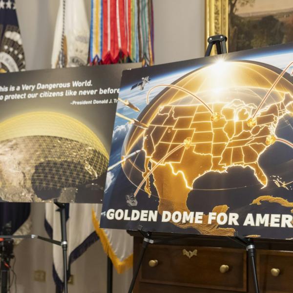 Posters that Trump used to announce Golden Dome, depicting missile defense as a shield