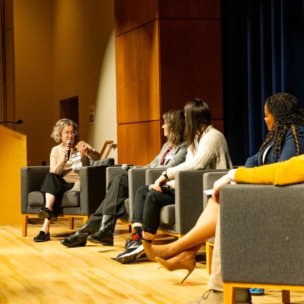 panelists on stage during the Student Success Conference