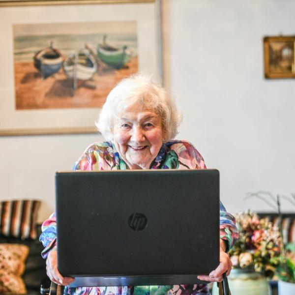elderly person with a laptop