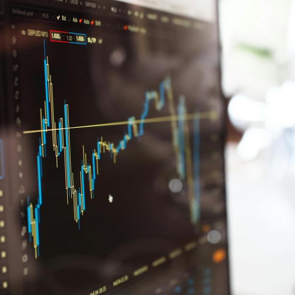 stock market prices on a computer screen.