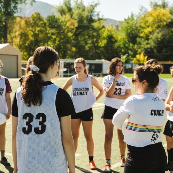Students participating in ultimate frisbee