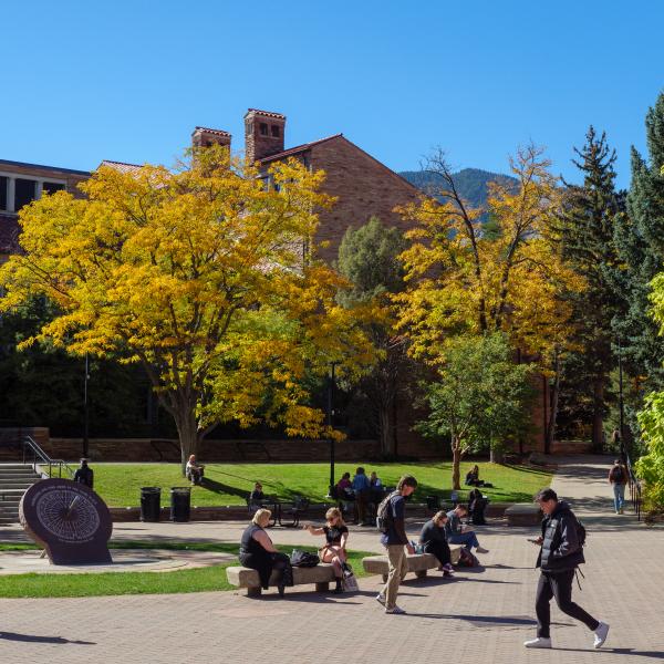 campus community members outside of Norlin Library in the fall