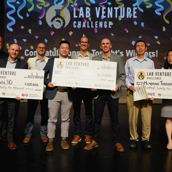 finalists with giant prize checks