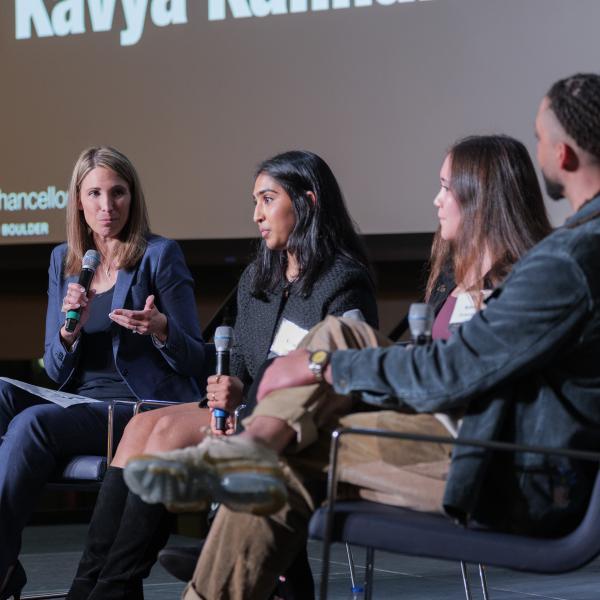 Stefanie Johnson hosting a panel discussion at the 2024 Chancellor's Summit